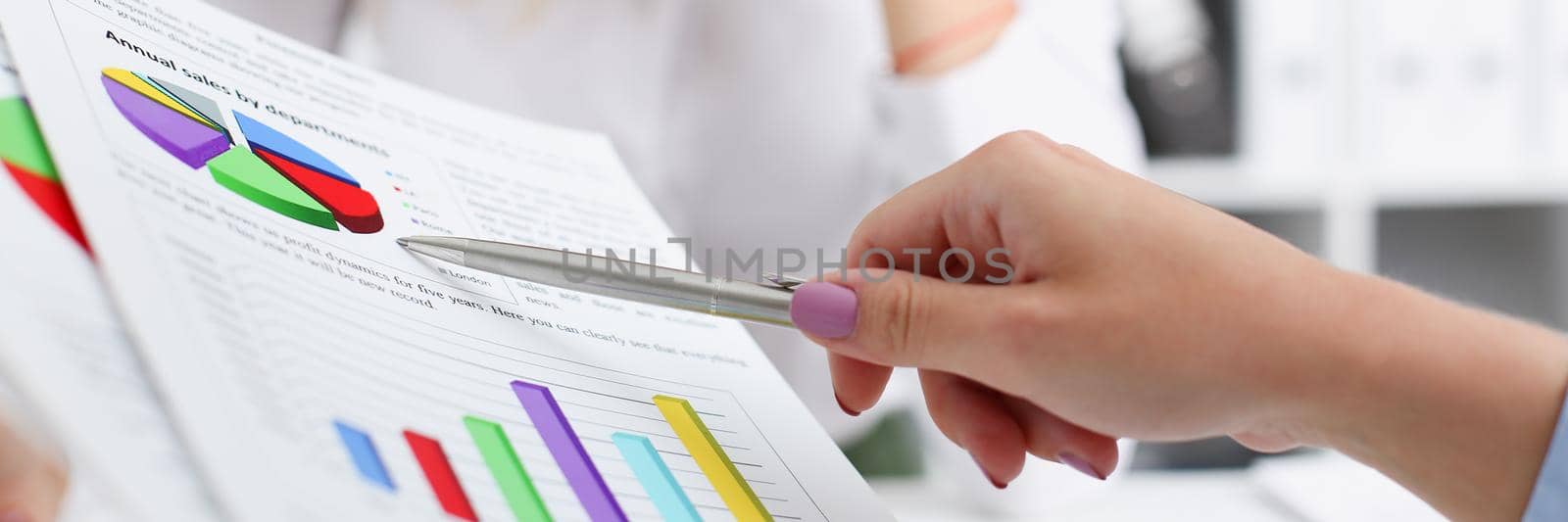 Group of people deliberate on problem with clipboard pad closeup. White collar check money papers, stock exchange market, earnings list, partnership agreement discussion or dispute concept