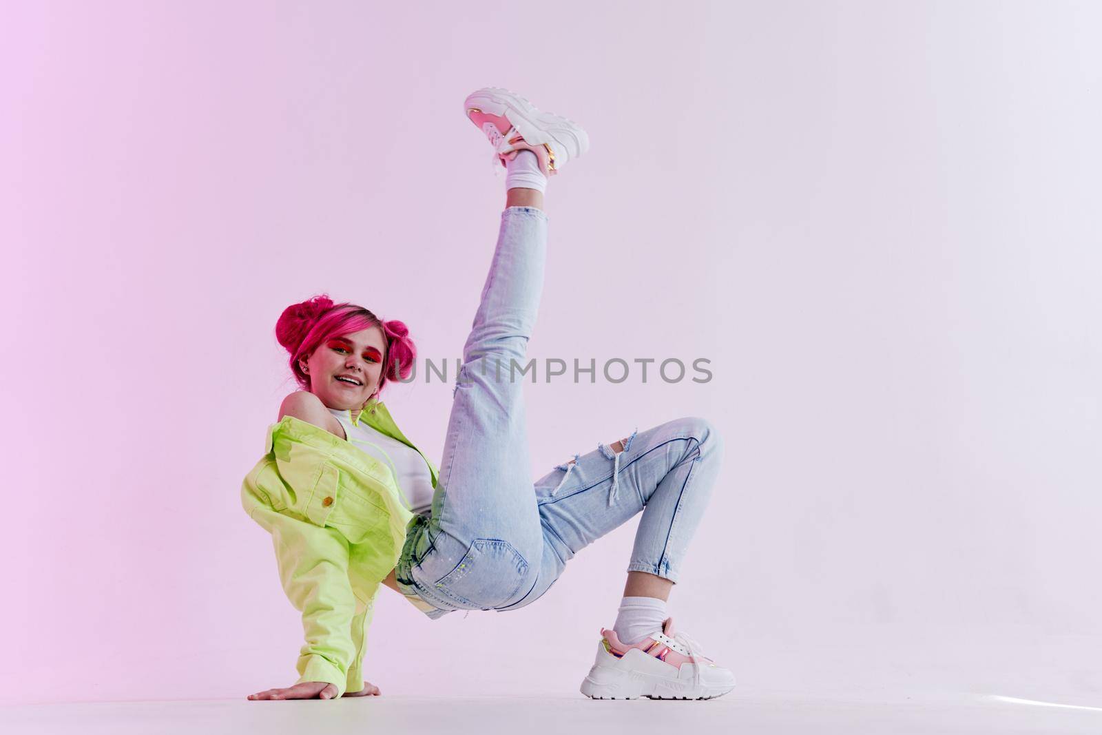 fashionable woman pink hair posing fashion clothes lifestyle fun design. High quality photo