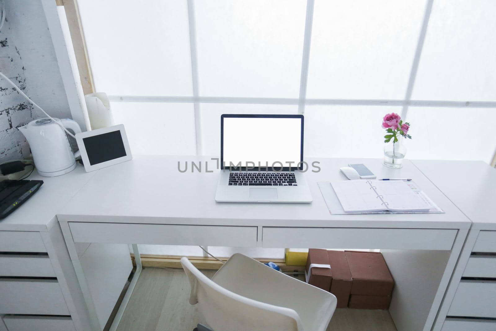 Modern interior workplace with laptop in white colors by ElenaBatkova