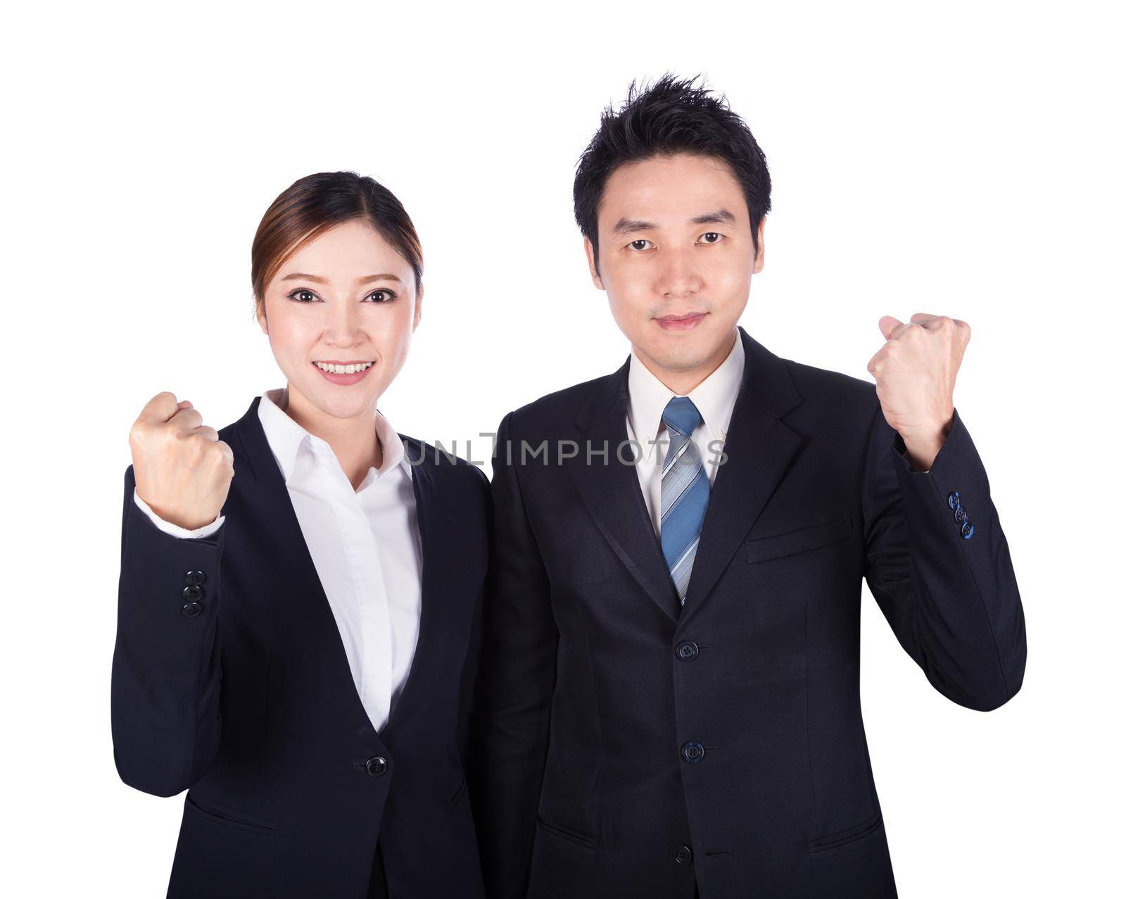 Successful business man and woman with arm raised isolated on white background