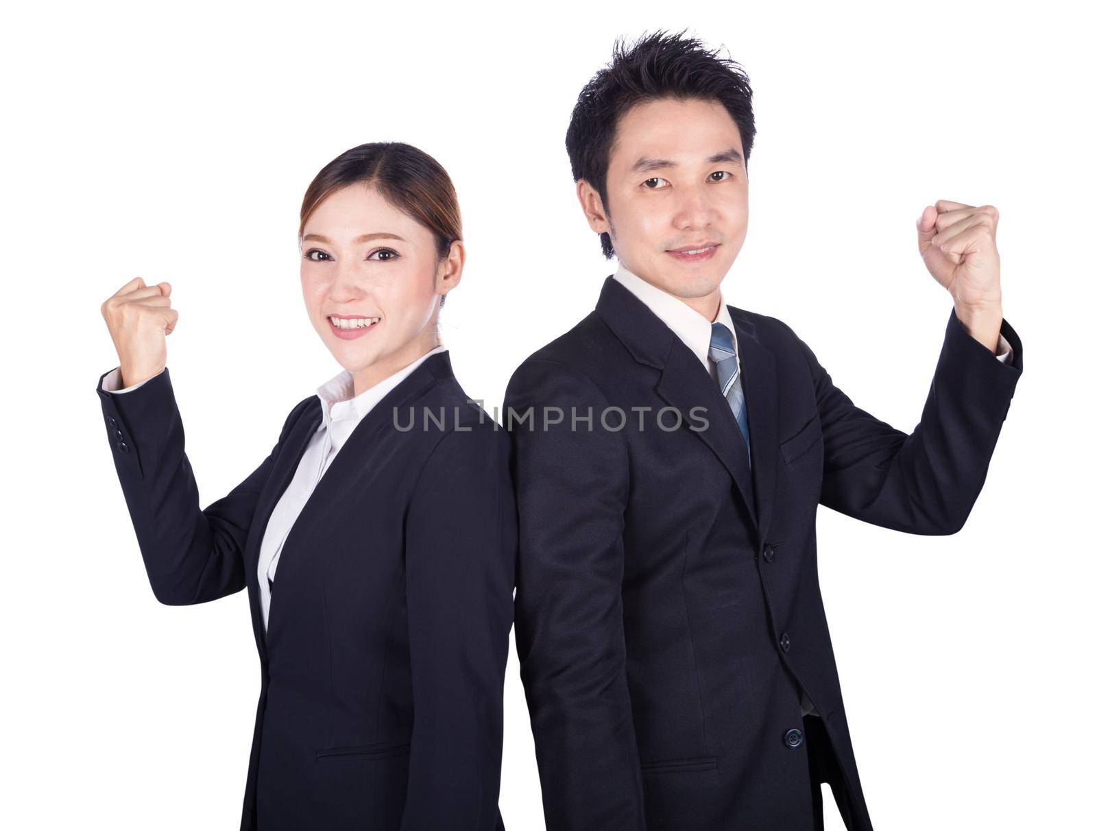 Successful business man and woman with arm raised isolated on white  by geargodz