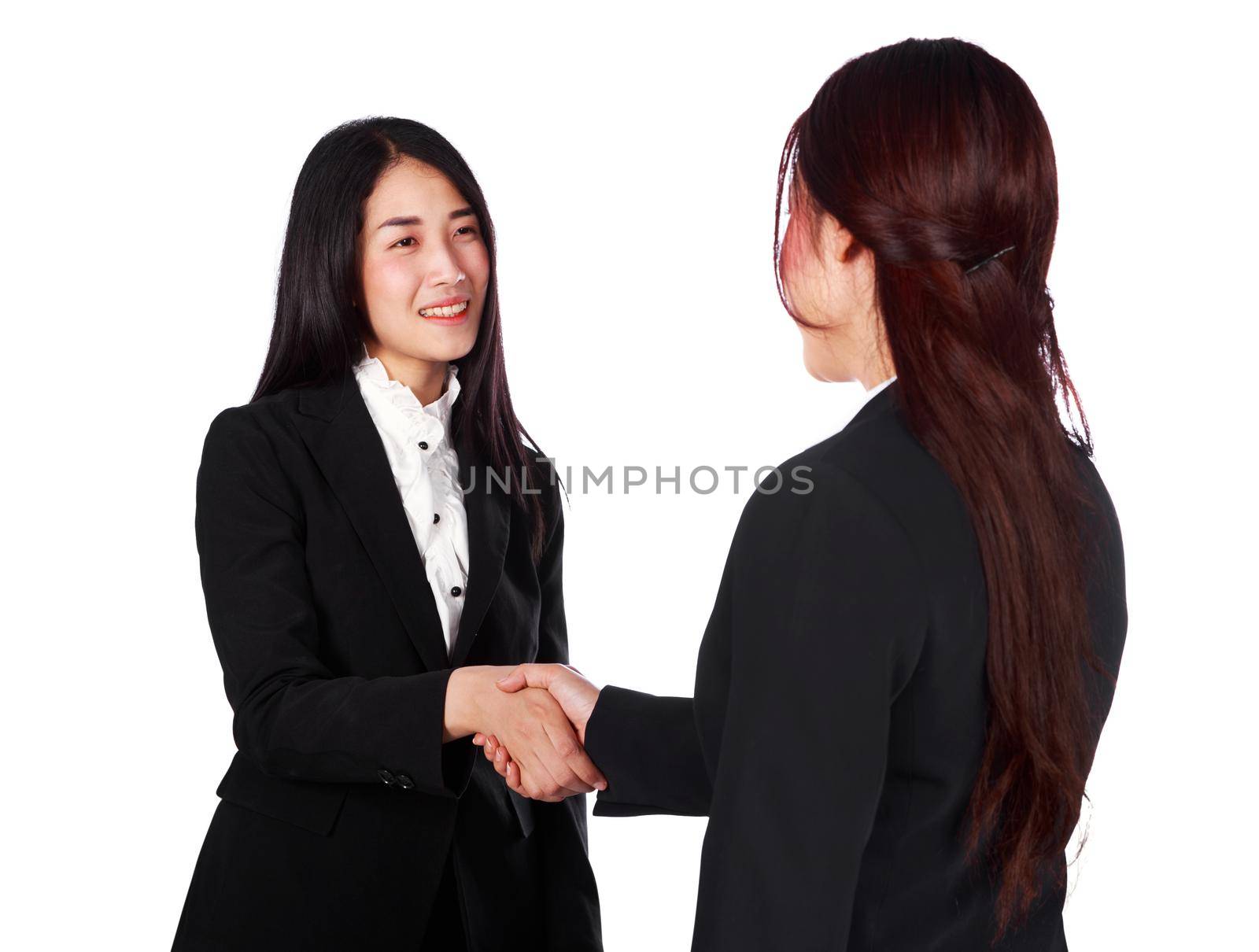 two business woman shaking hands isolated on a white background