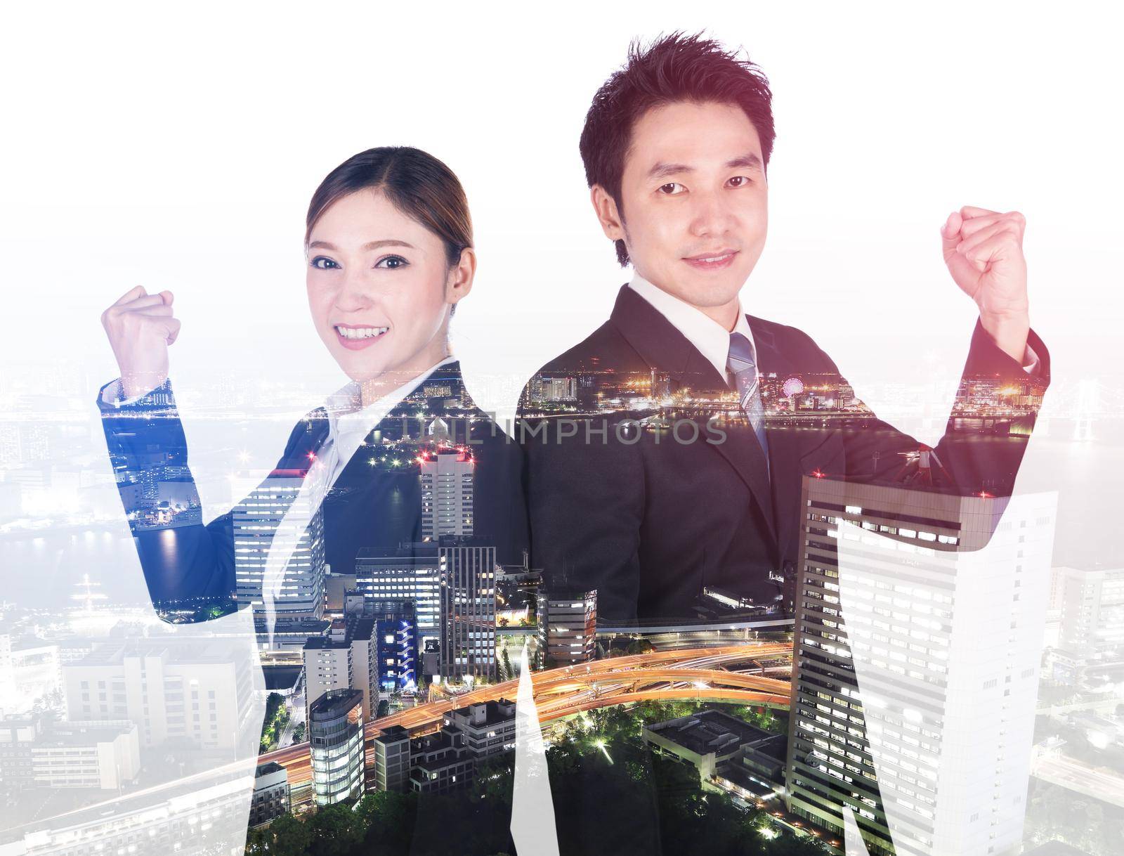 double exposure of successful business man and woman with arm raised with city background by geargodz