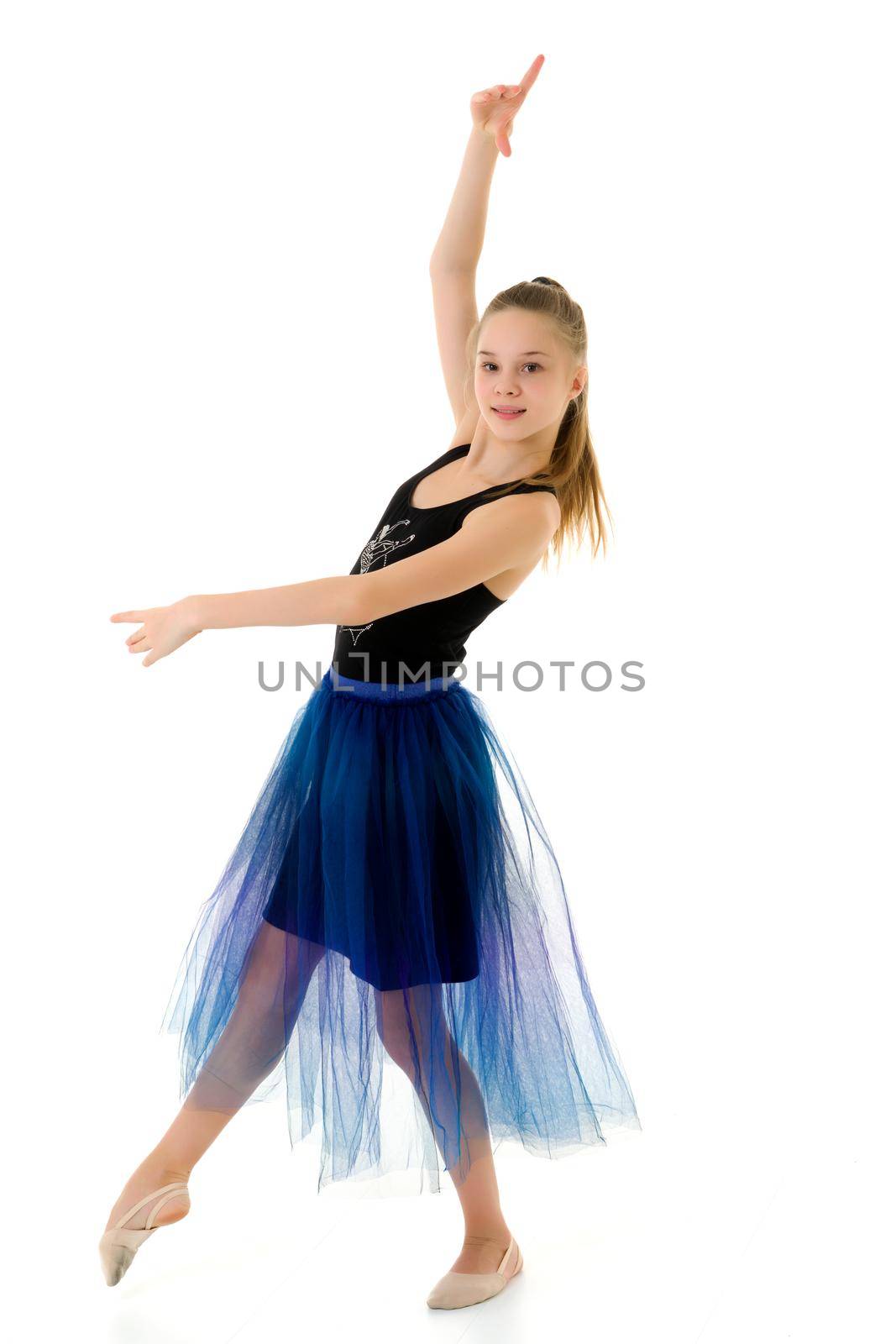 Graceful Girl Gymnast Performing Rhythmic Gymnastics Exercise, Sportive Girl Dancing Wearing Sport Dress, Beautiful Long Haired Teenager Posing in Studio Against White Background