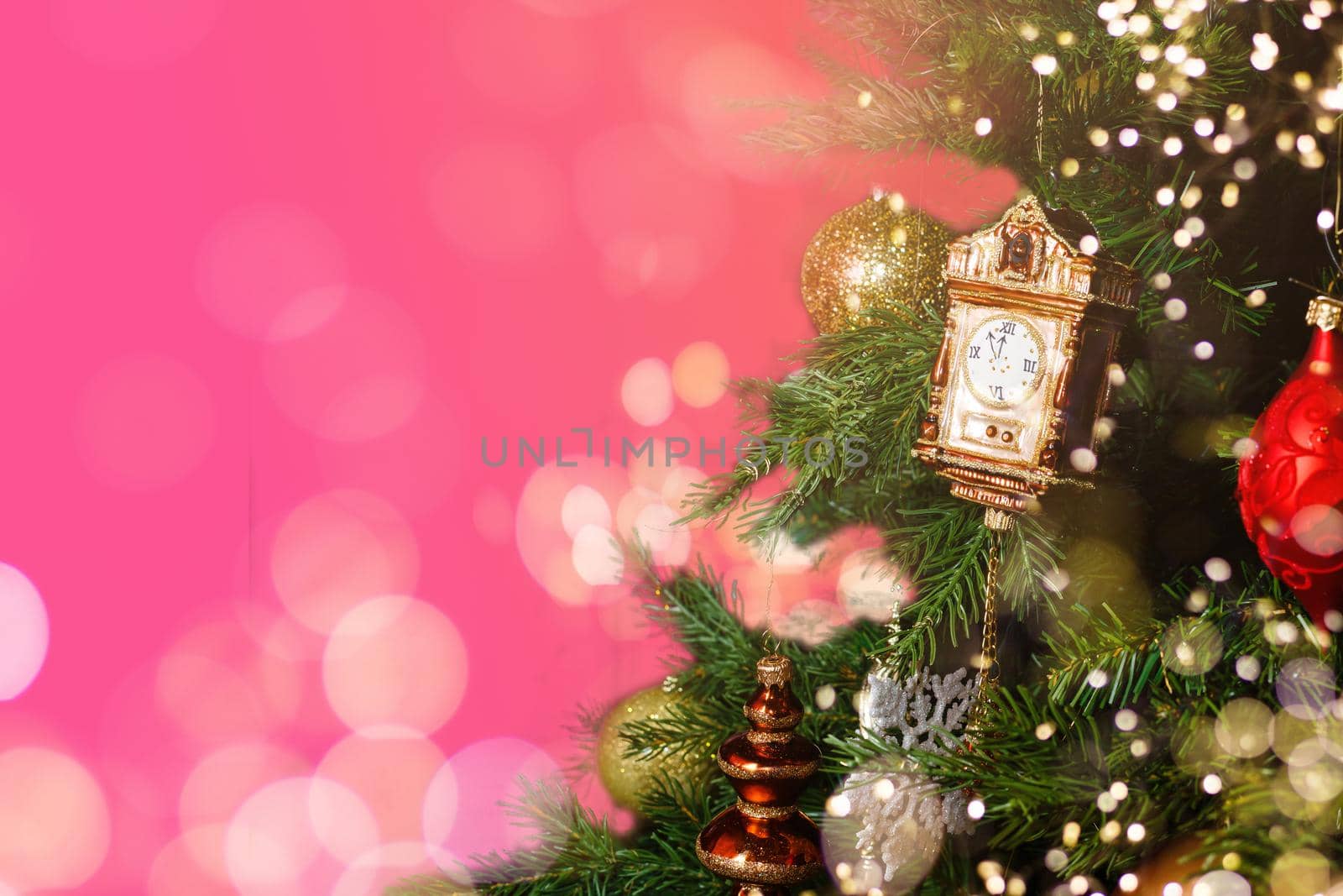 Decorated Christmas tree closeup, balls, garland.