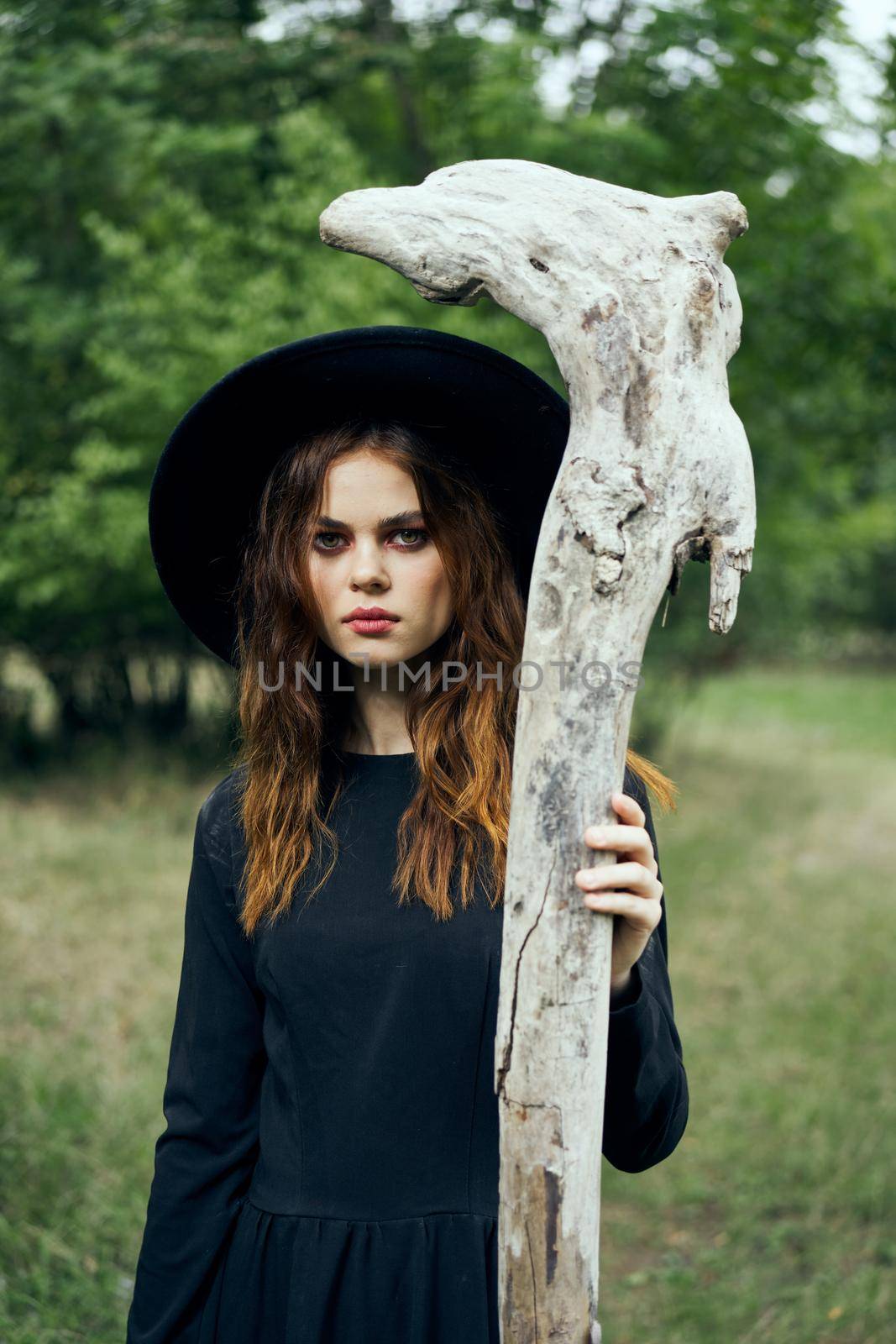 woman in witch costume halloween forest staff gothic by Vichizh