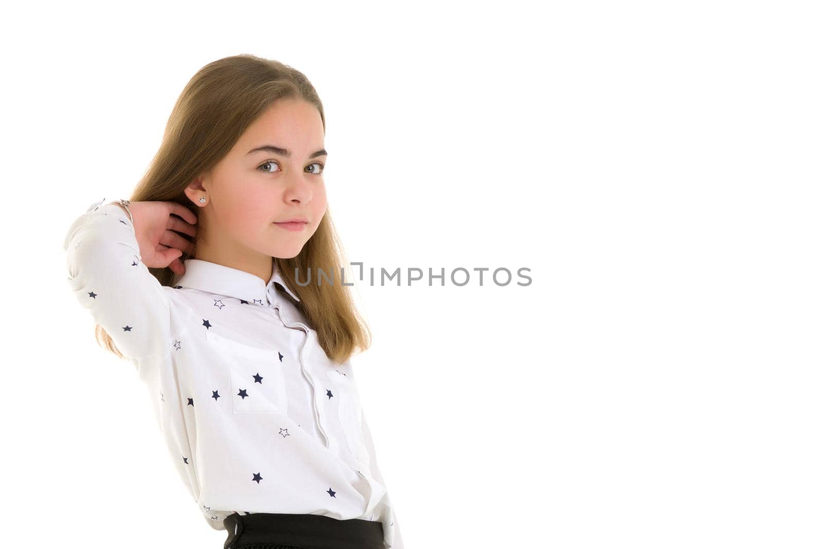 Beautiful little girl close-up. The concept of beauty and fashion, happy childhood. Isolated on white background.