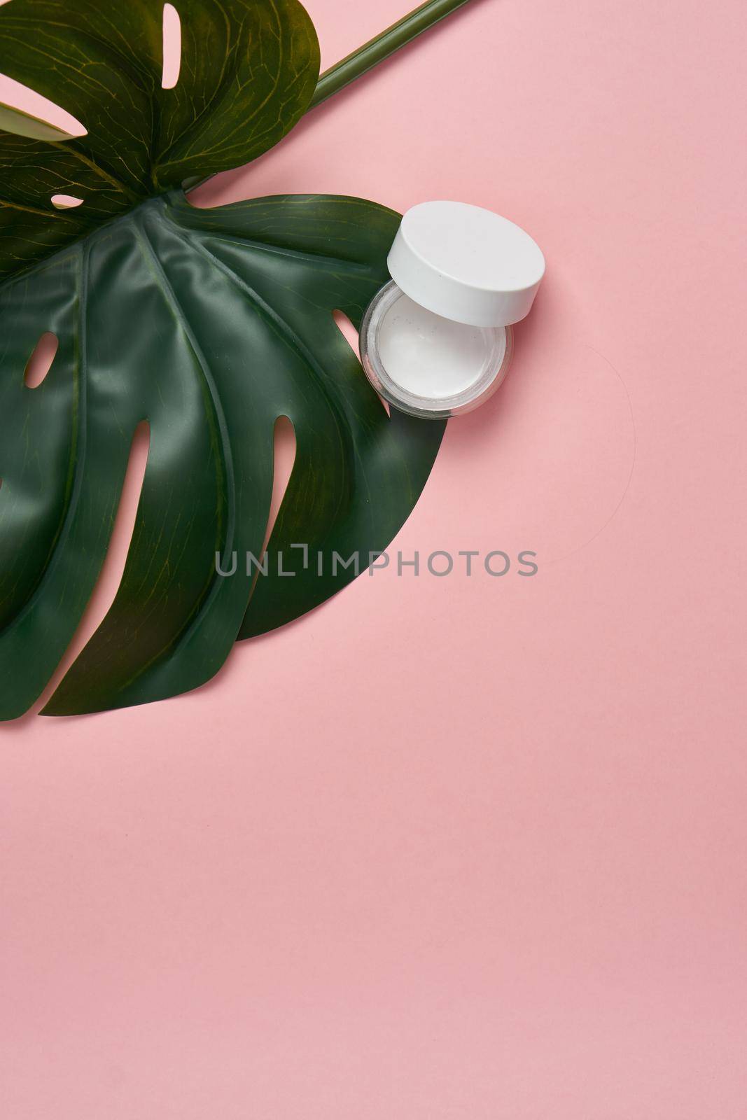 spa products cosmetics health procedures pink background by Vichizh