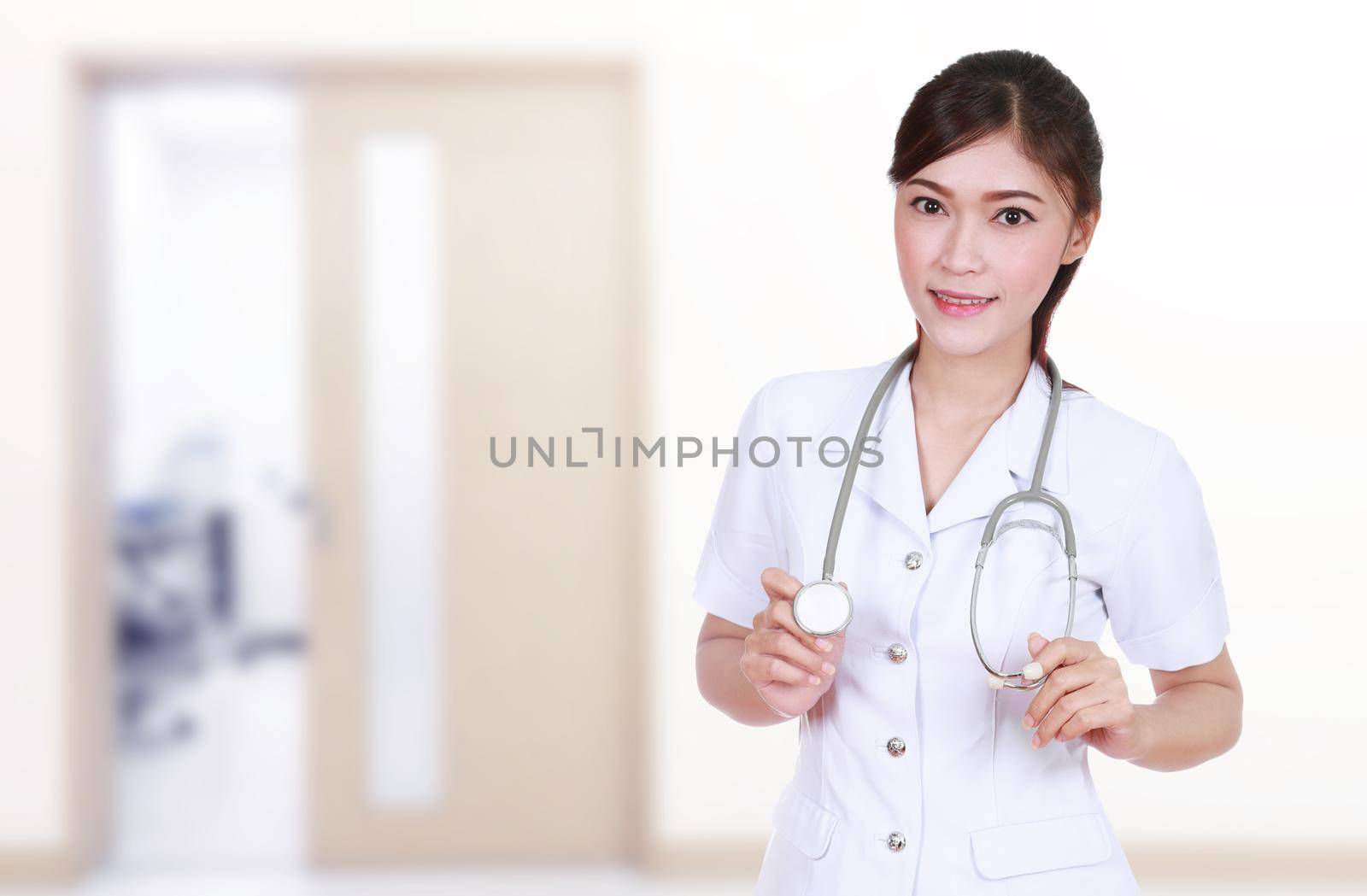 nurse with stethoscope in hospital background by geargodz