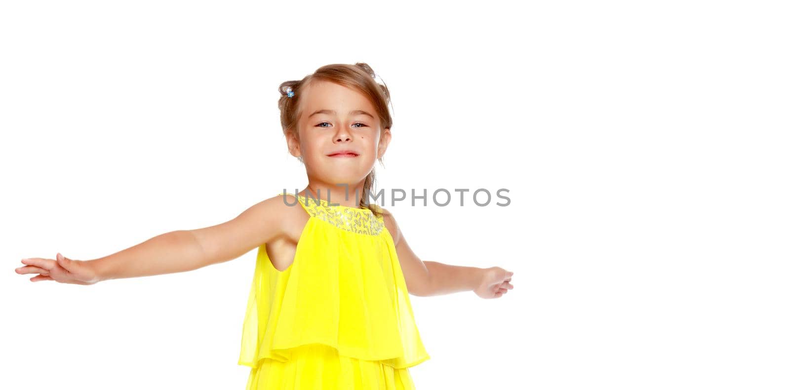 Beautiful little girl close-up. The concept of beauty and fashion, happy childhood. Isolated on white background.