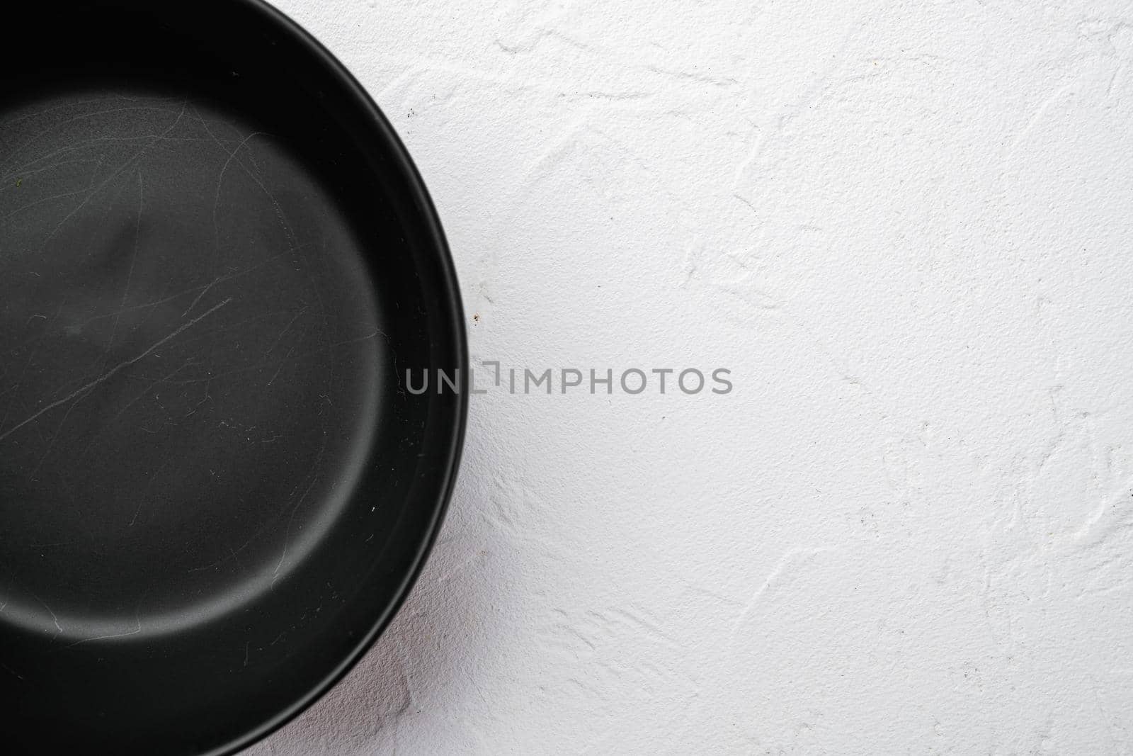 Empty black bowl set, with copy space for text or food, with copy space for text or food, top view flat lay, on white stone table background