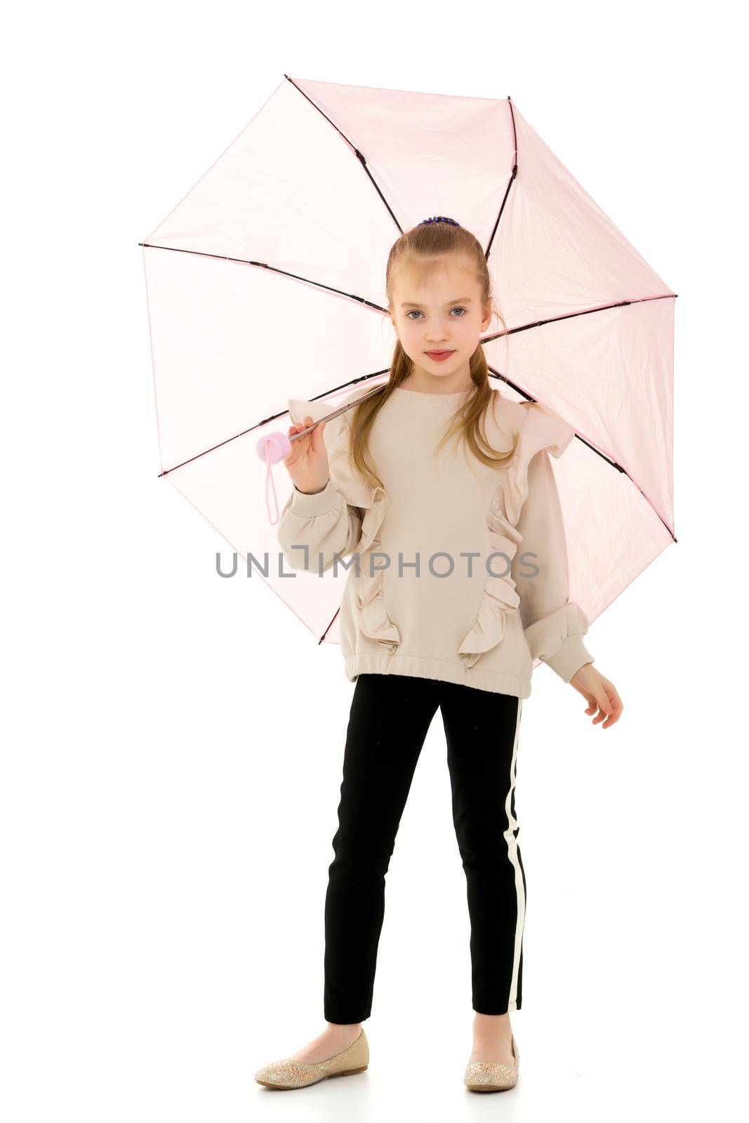 Beautiful little girl with umbrella. Concept of weather, climate change. Isolated on white background