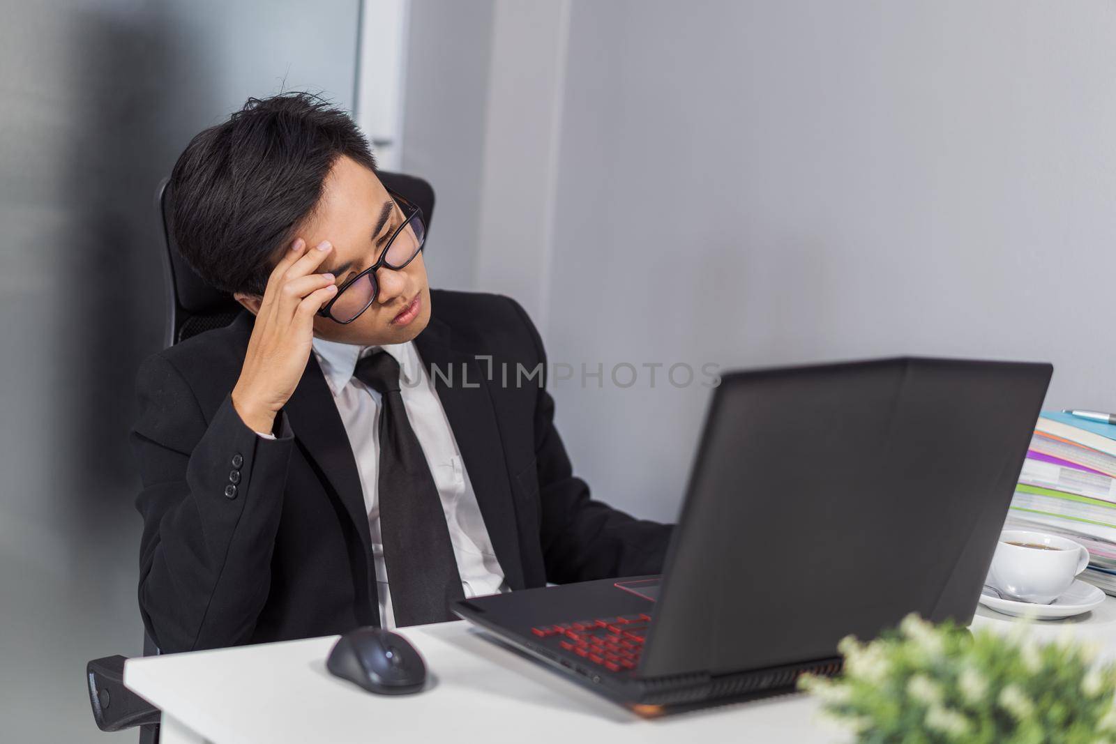 business man working problem using laptop by geargodz