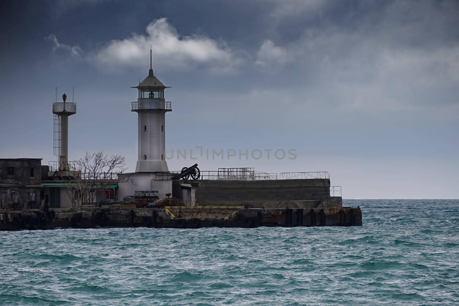 Yalta, Crimea. Seascape with a view of the white lighthouse.