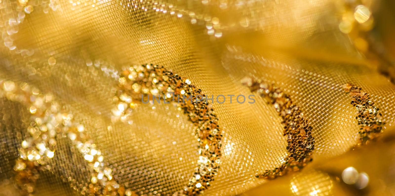 Golden abstract blur defocused background. Concept for New Years Eve, Christmas and happy holidays.
