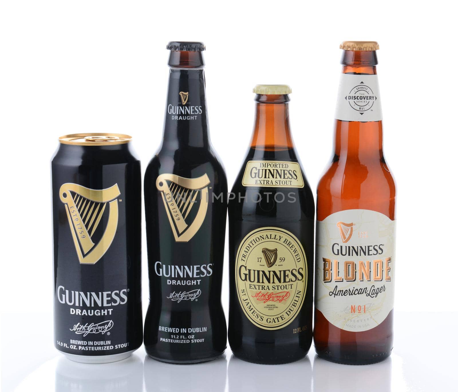 IRVINE, CA - JANUARY 12, 2015: Four bottles of beer from the Guinness Brewing Company.  Guinness has been producing beer in Ireland since 1759.
