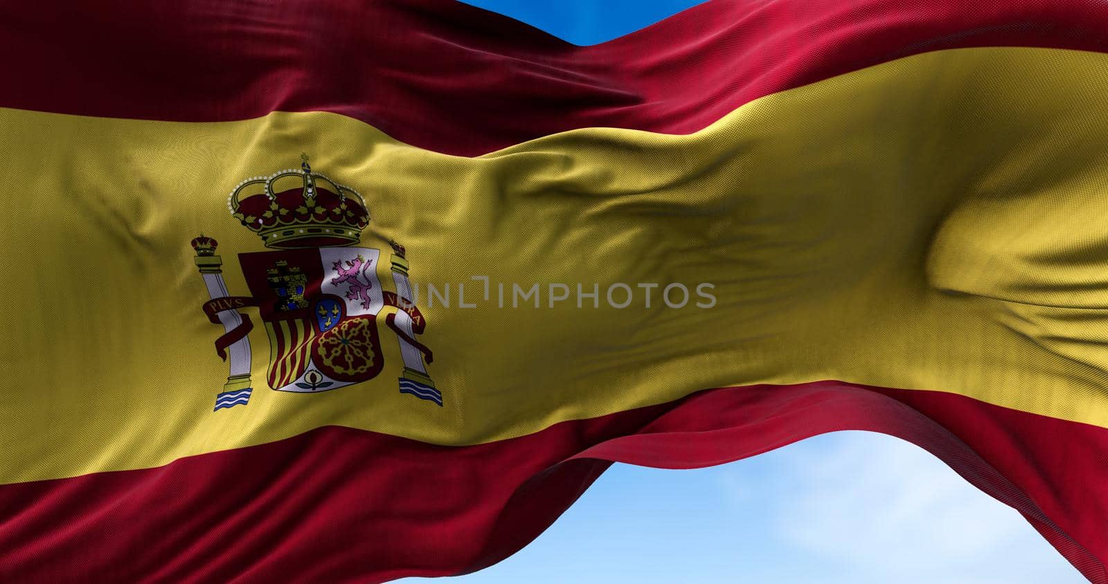 close up view of the Spanish national flag waving in the wind. Selective focus.