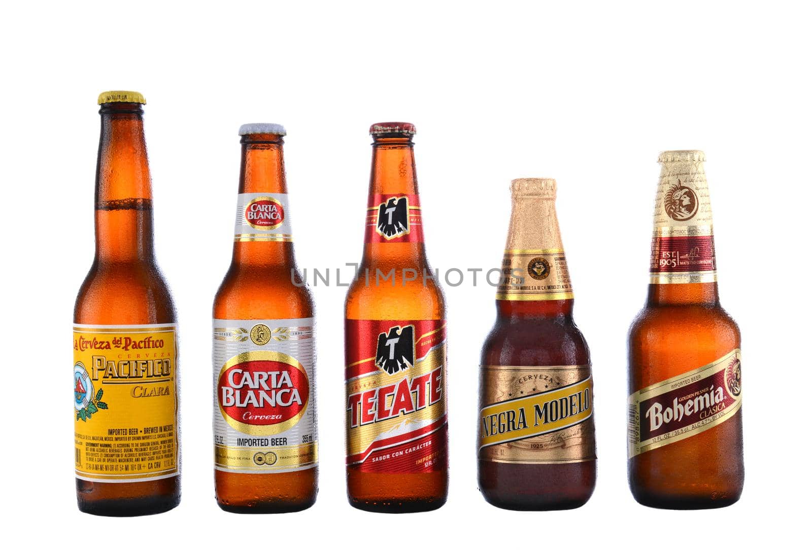 IRVINE, CA - JUNE 14, 2015: Five Mexican Beers. Pacifico, Carta Blanca, Tecate, Negra Modelo, and Bohemia are five of the most popular Mexican beers imported into the US. 