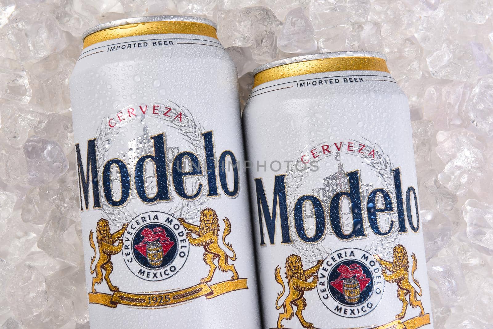 Two cans of  Modelo Especial on Ice Closeup by sCukrov