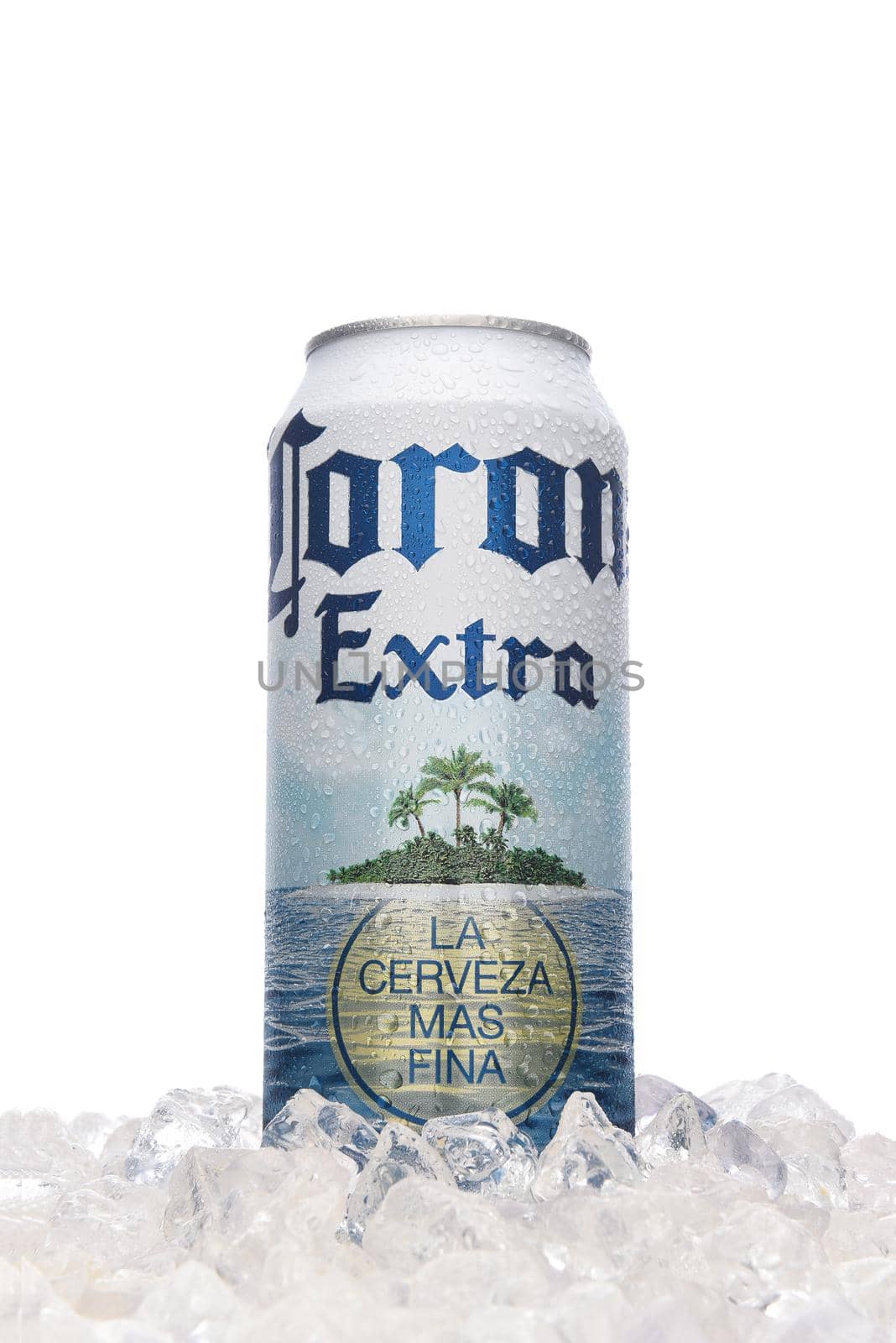 IRVINE, CALIFORNIA - MARCH 21, 2018: A 24 ounce can of Corona Extra on ice. Corona Extra is a pale lager produced by Cerveceria Modelo in Mexico for domestic distribution and export.