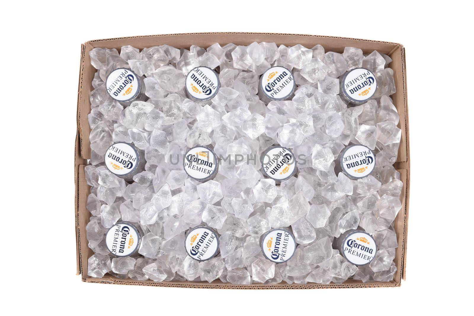 IRVINE, CALIFORNIA - 10 MAR 2020: High angle view of a 12 pack of Corona Premier bottles with ice cubs in the box.