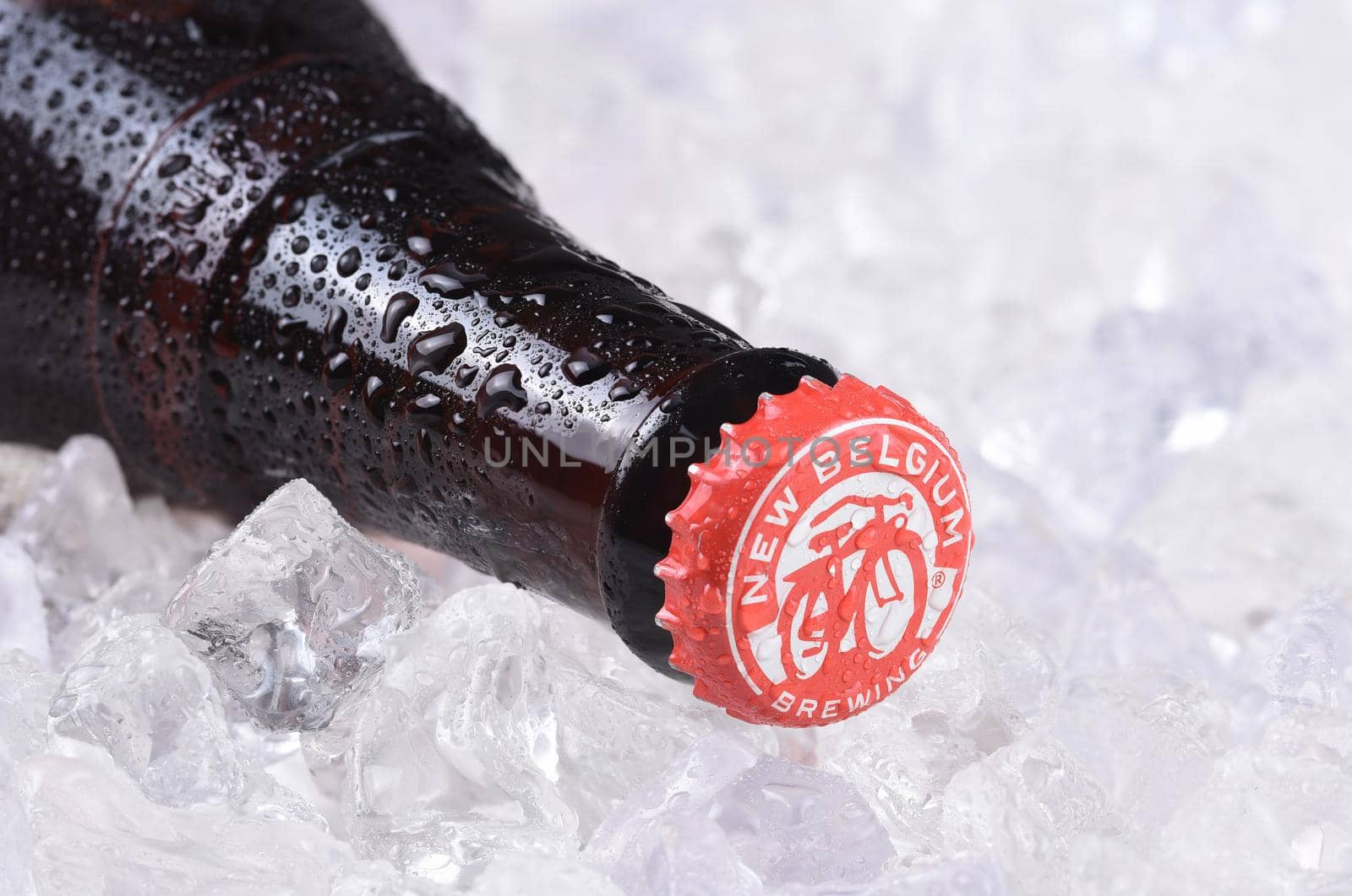 IRVINE, CALIFORNIA - December 14, 2017: Fat Tire Amber Ale bottle on ice. From the New Belgium Brewing Company, of Fort Collins, Colorado.