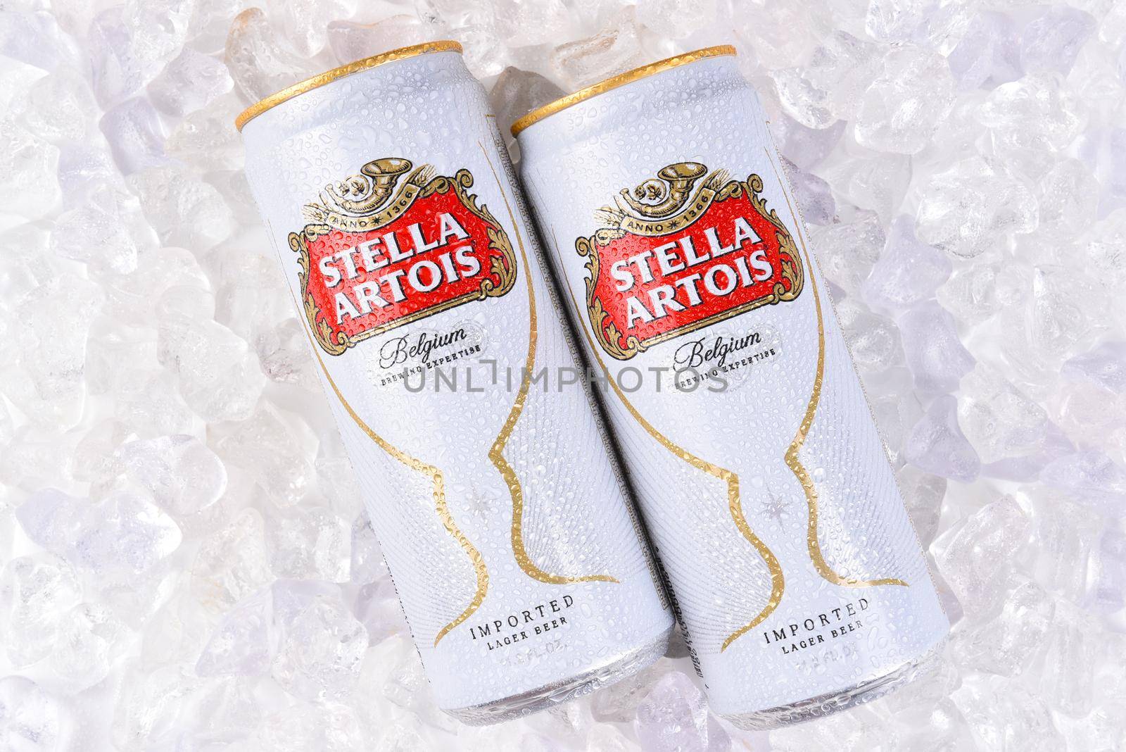 IRVINE, CA - JULY, 17, 2017: Cans of Stella Artois Beer closeup on Ice. Stella has been brewed in Leuven, Belgium, since 1926, and launched as a festive beer, named after the Christmas star.