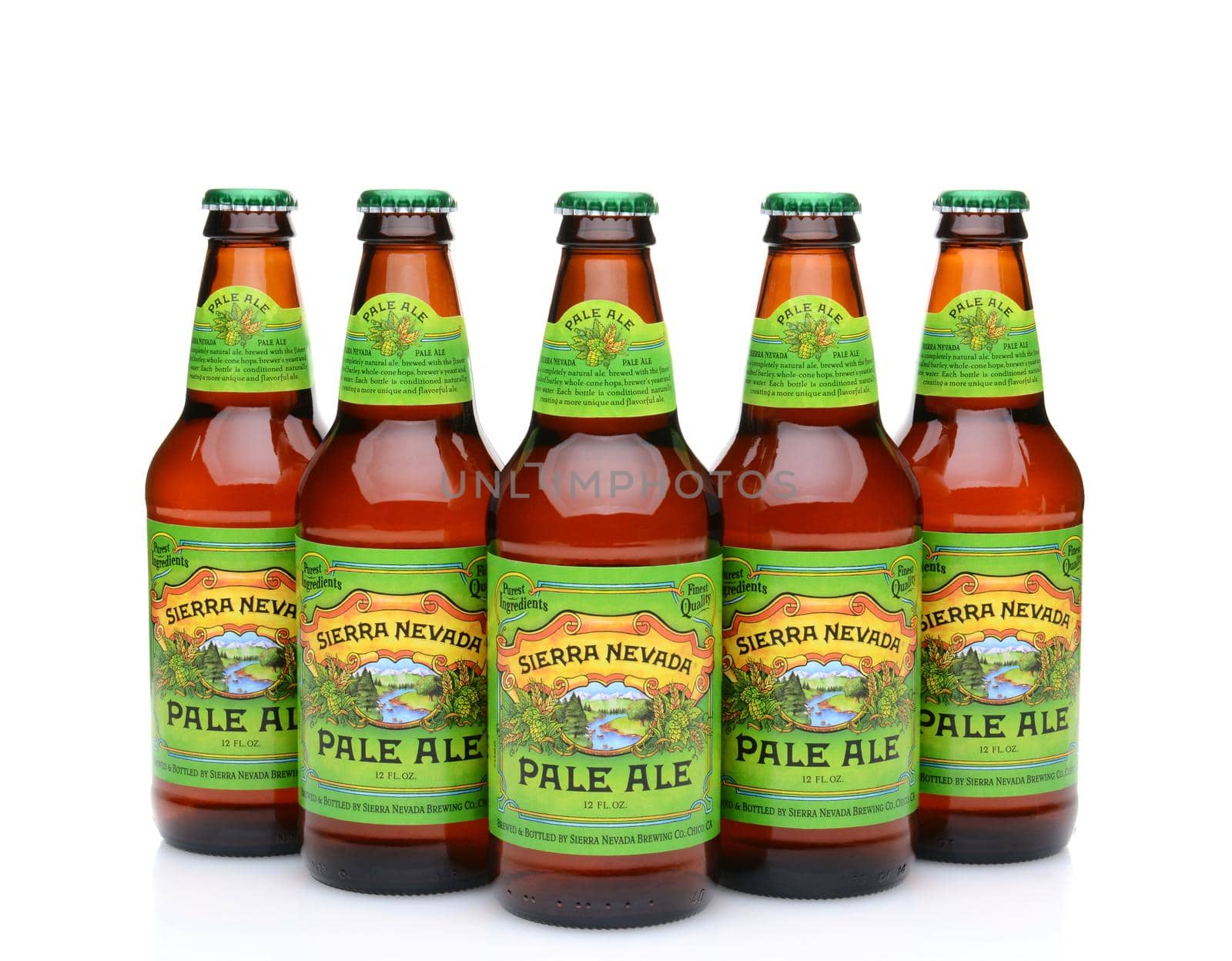 IRVINE, CA - MAY 25, 2014: Five bottles of Sierra Nevada Pale Ale on white. Sierra Nevada Brewing Co. was established in 1980 by homebrewers in Chico, California,