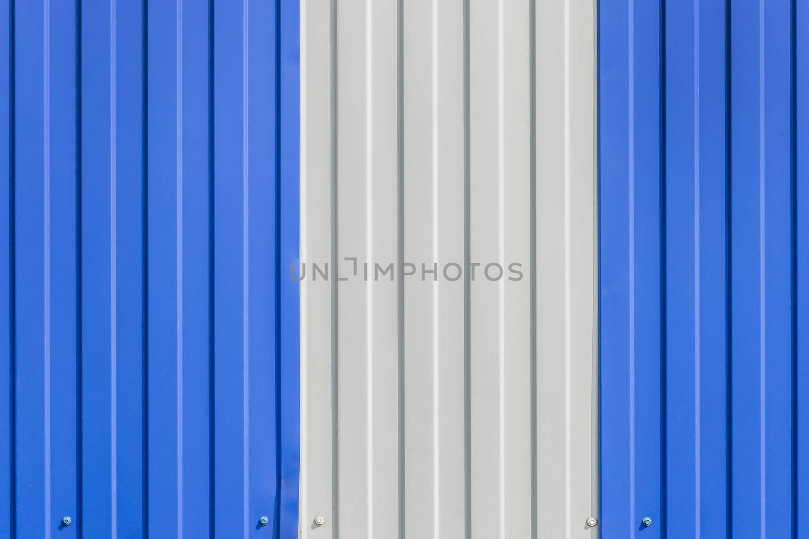 Blue and White Painted Sheet Metal Plates Iron Fence Texture Background.