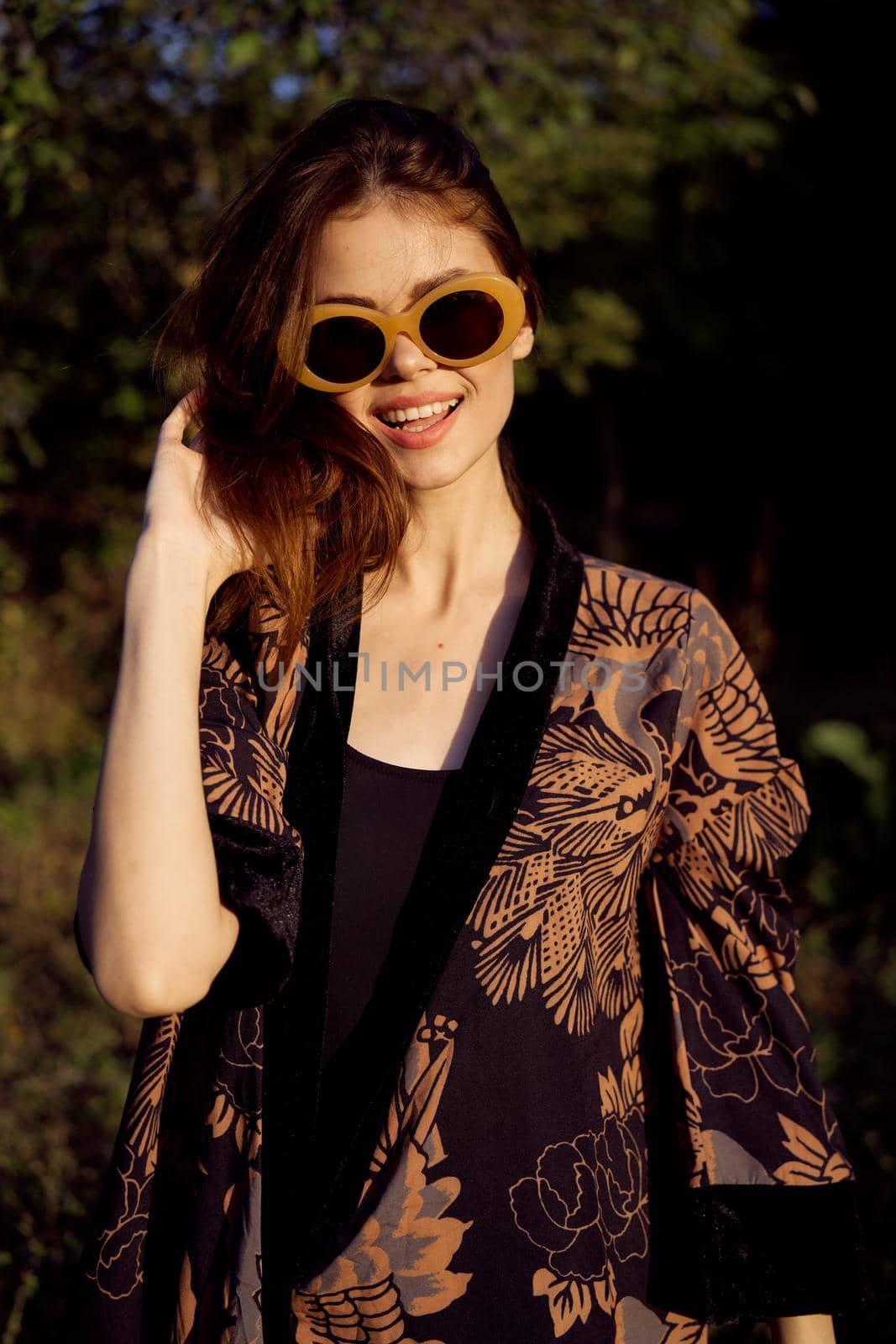 woman wearing sunglasses outdoors posing fashion glamor by Vichizh