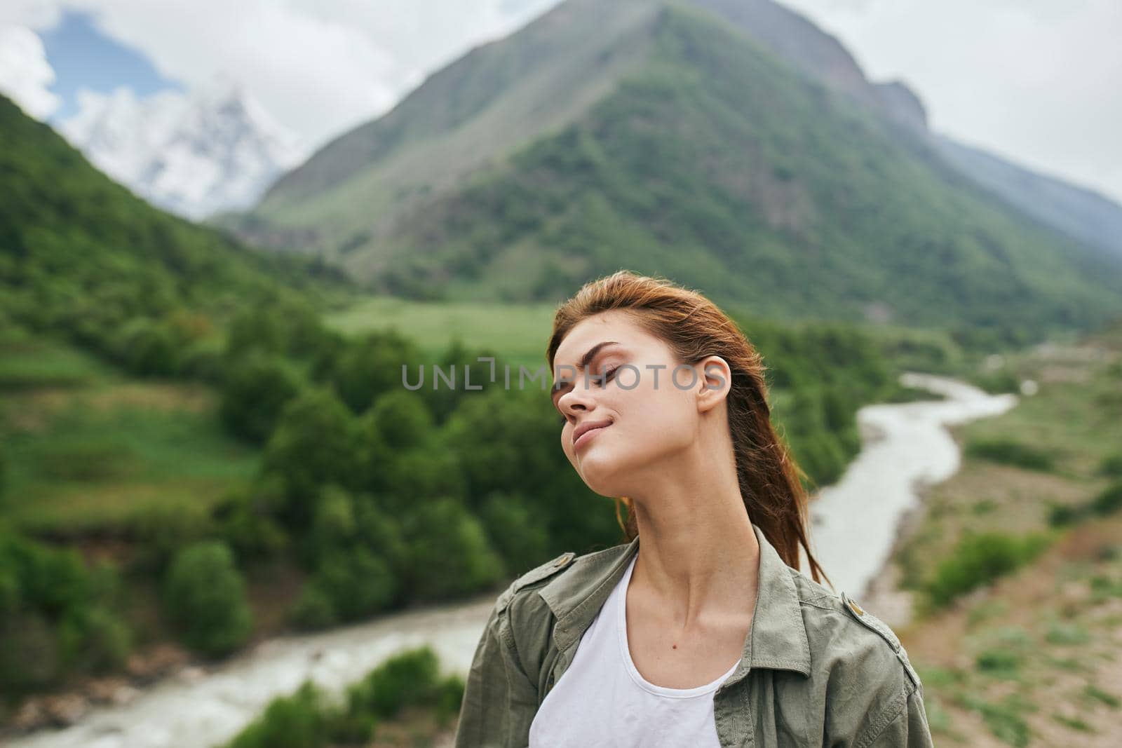 women hikers in the mountains walk travel landscape. High quality photo