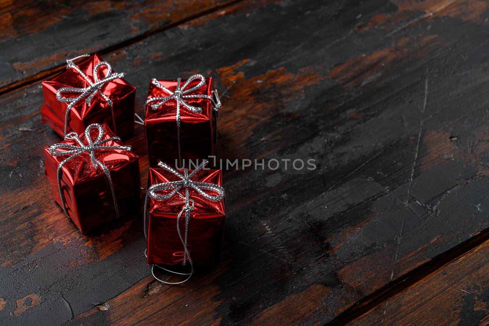 Ball for the Christmas tree set, on old dark wooden table background, with copy space for text