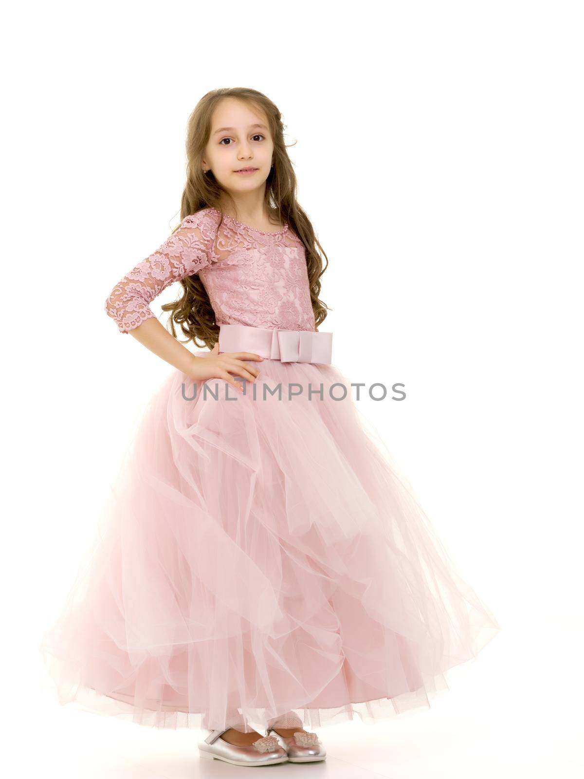 Full Length Portrait of Teen Girl Standing Half Turn, Beautiful Girl Wearing Dress Looking at Camera, Teenager in Stylish Clothes Posing in Studio Against White Background