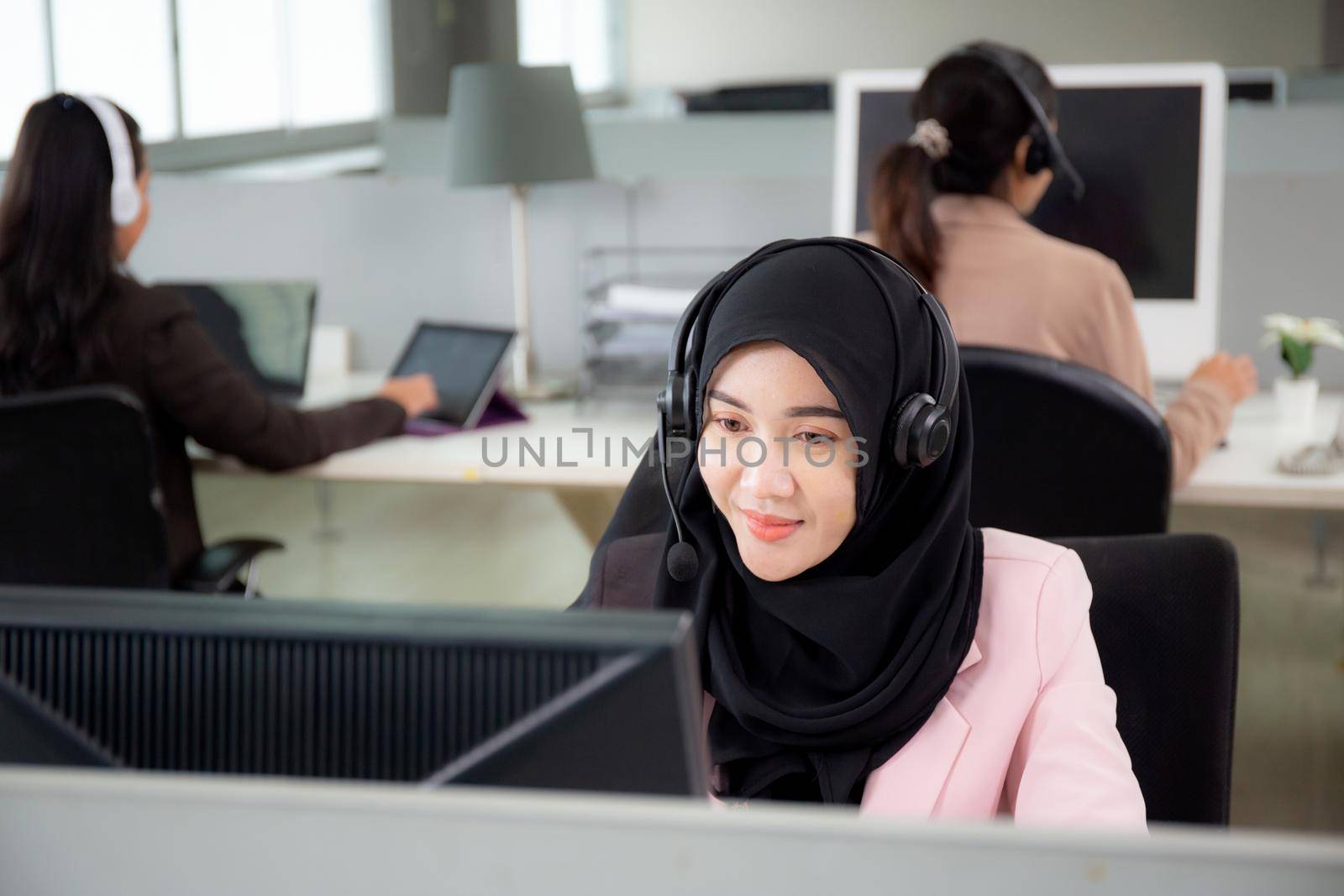 Customer service with friendly, woman call center and operator for support client, group of business team with assistance and consultant, adviser helpdesk and contact, communication concept. by nnudoo