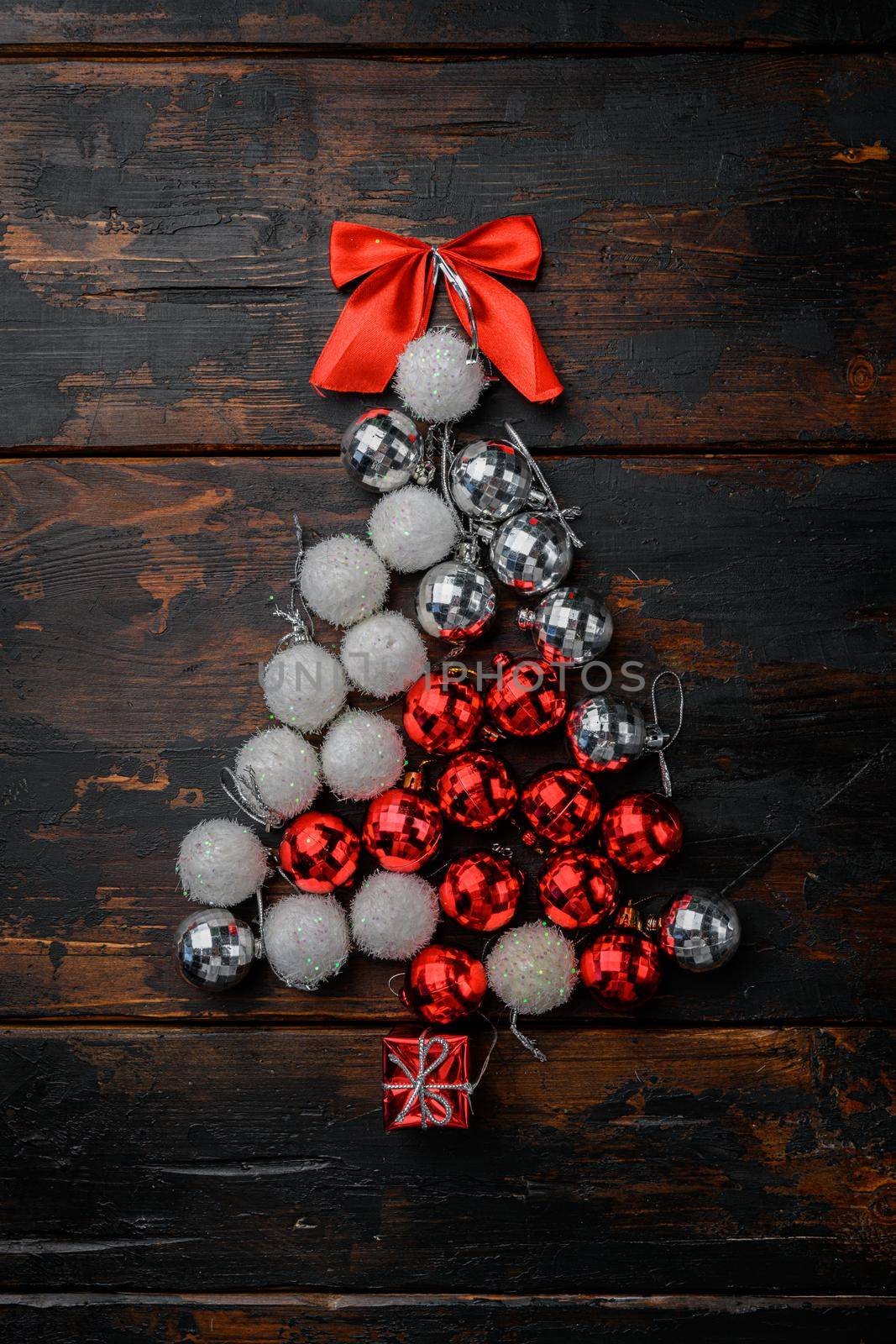 Christmas tree from toys concept set, on old dark wooden table background, top view flat lay