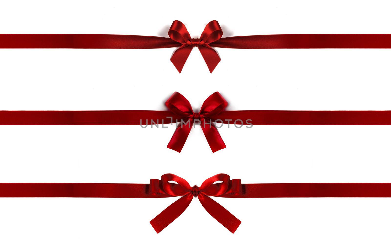 Set of red satin bow isolated on white background. Christmas holiday gift concept
