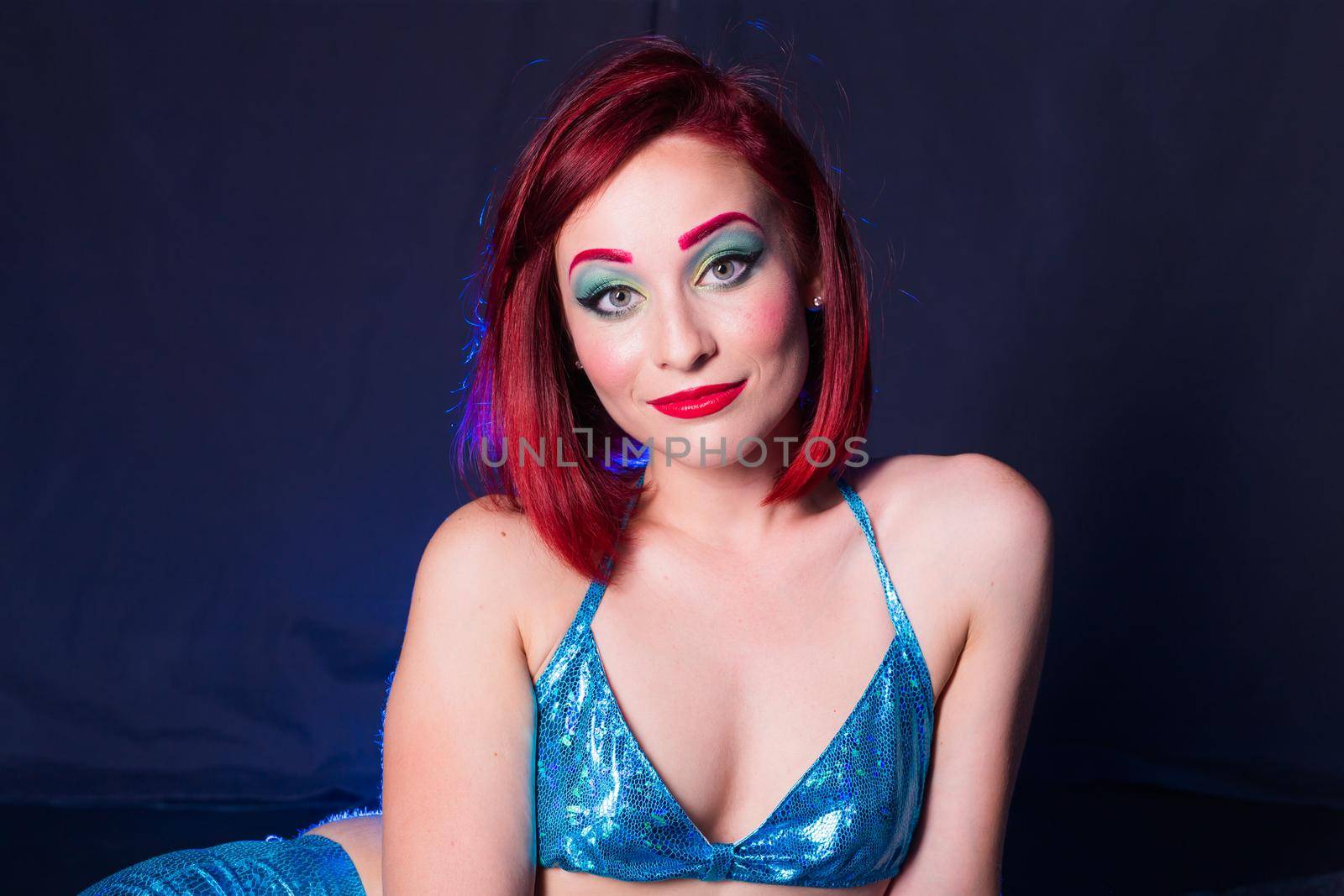 Young beautiful girl at the image of mermaid. Fairy tales, mythical characters and the underwater world