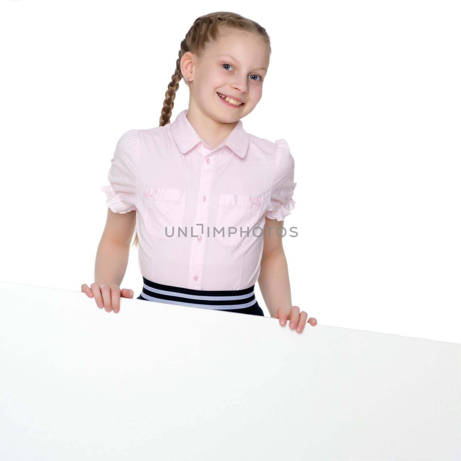 Beautiful little girl close-up. The concept of beauty and fashion, happy childhood. Isolated on white background.