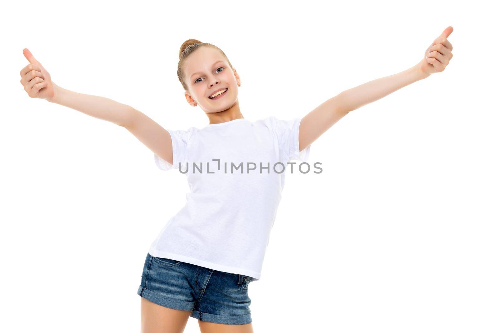 A beautiful girl in a clean white T-shirt is holding a thumb up. The concept can be used to advertise goods and services, whose logo can be printed on the surface of the shirt. Isolated on white background.