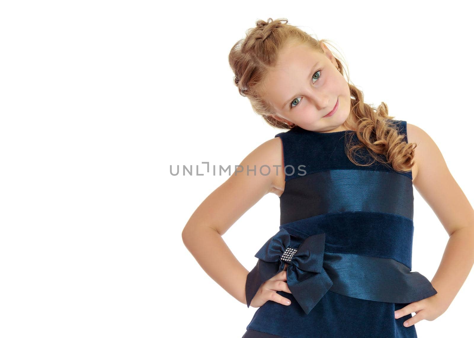 Beautiful little girl close-up. The concept of beauty and fashion, happy childhood. Isolated on white background.