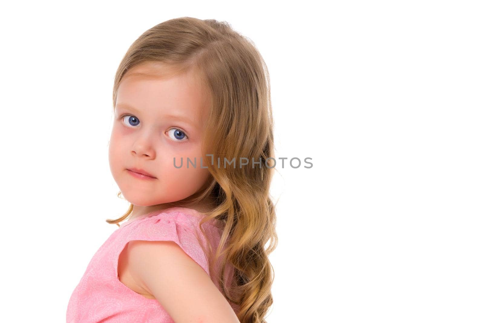 Beautiful little girl close-up. The concept of beauty and fashion, happy childhood. Isolated on white background.