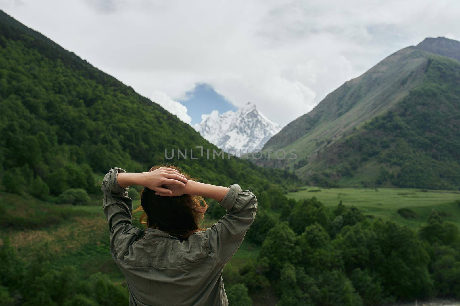 woman hiker nature mountains landscape fresh air. High quality photo
