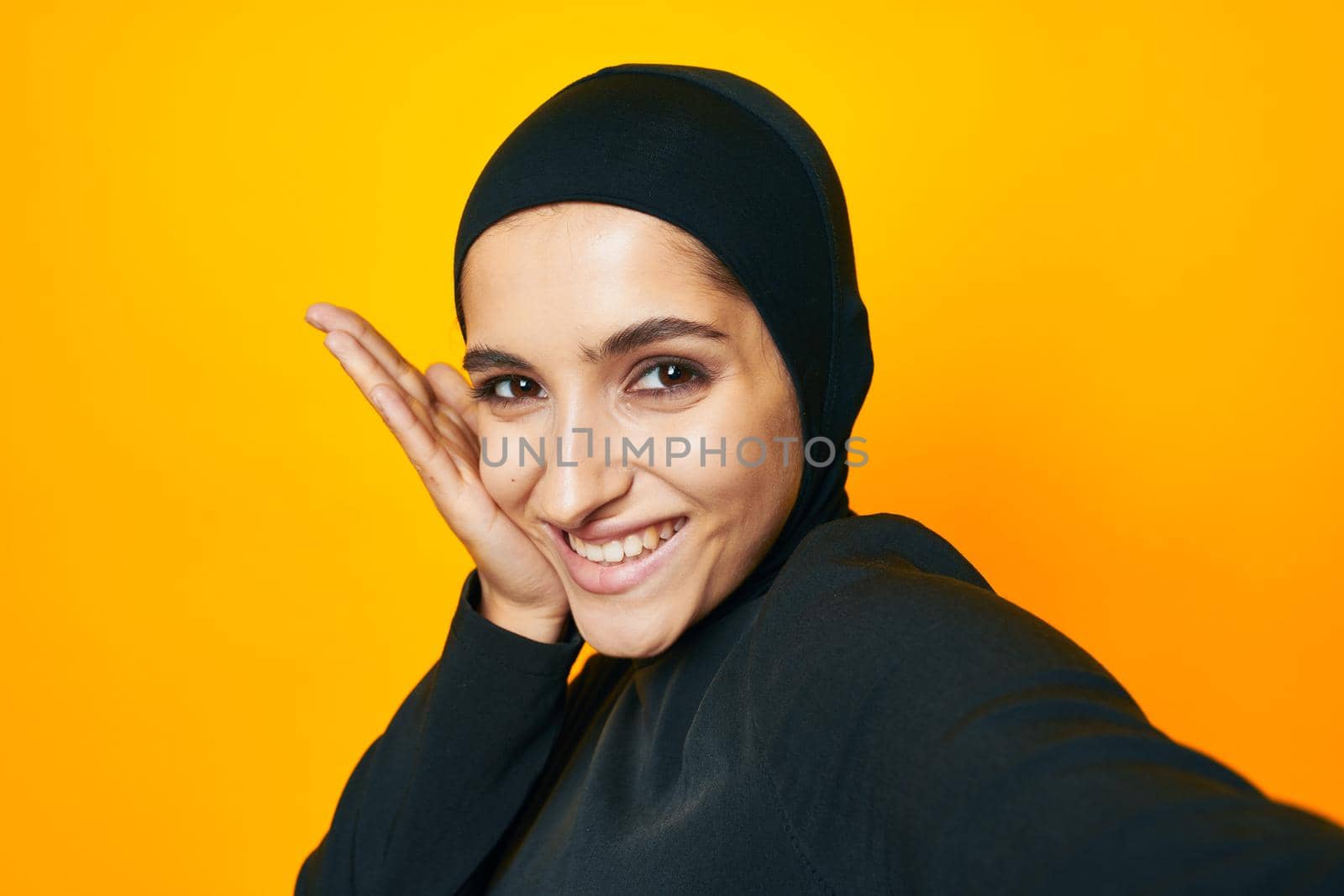 cheerful woman fun ethnicity model posing emotions yellow background. High quality photo