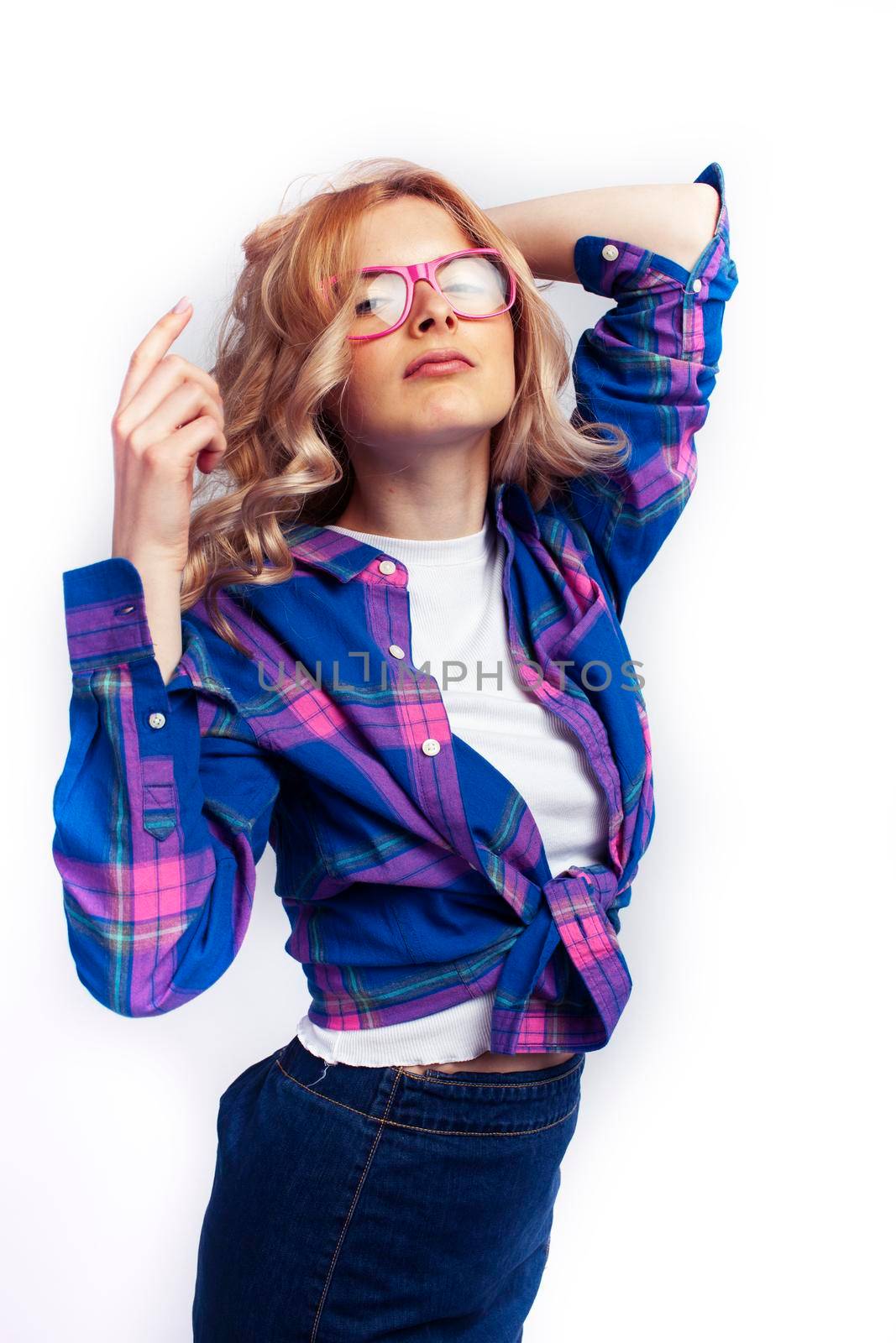 young pretty stylish hipster girl posing emotional isolated on white background happy smiling cool smile, lifestyle people concept close up