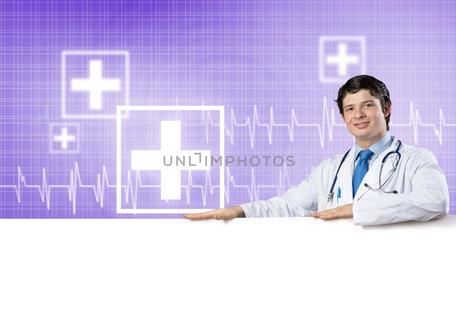 Young handsome doctor holding white blank banner. Place your text