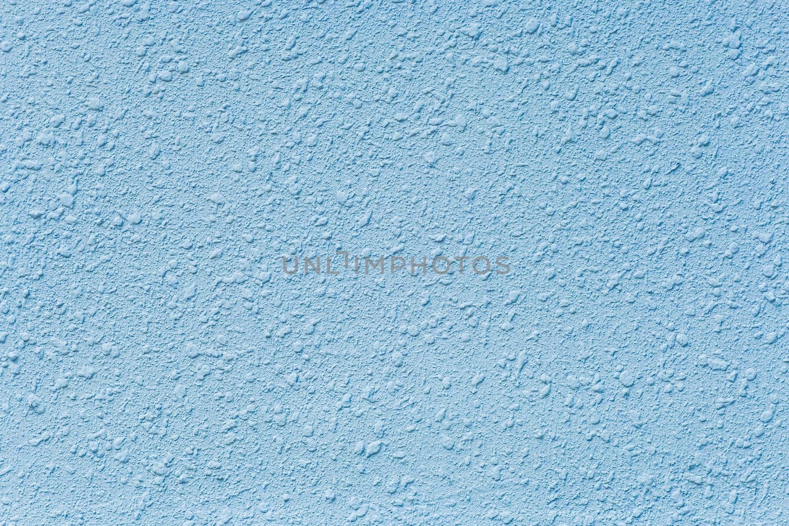 Blue abstract plaster pattern wall texture, stucco surface grunge background.