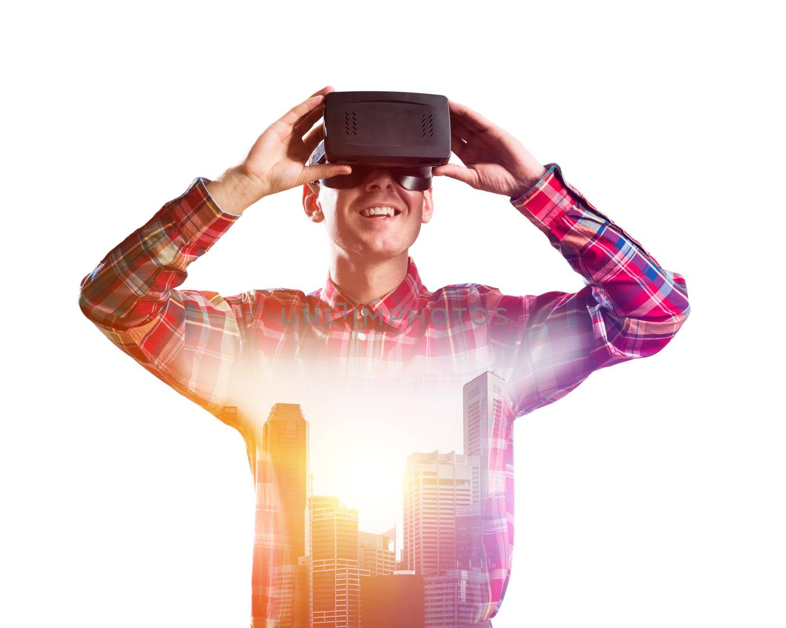 Young man with virtual reality headset or 3d glasses over cityscape background