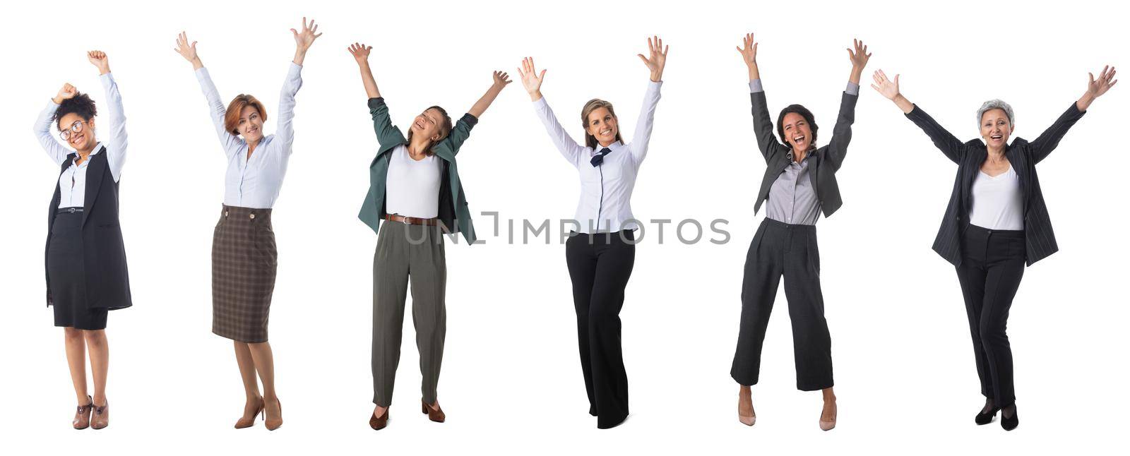 Group of happy smiling business women only with raised arms isolated on white background
