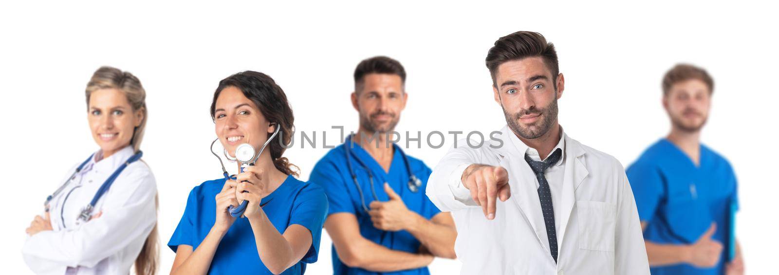 Group of medical doctors and surgeons people over white isolated background Pointing to you and camera with fingers, smiling positive and cheerful