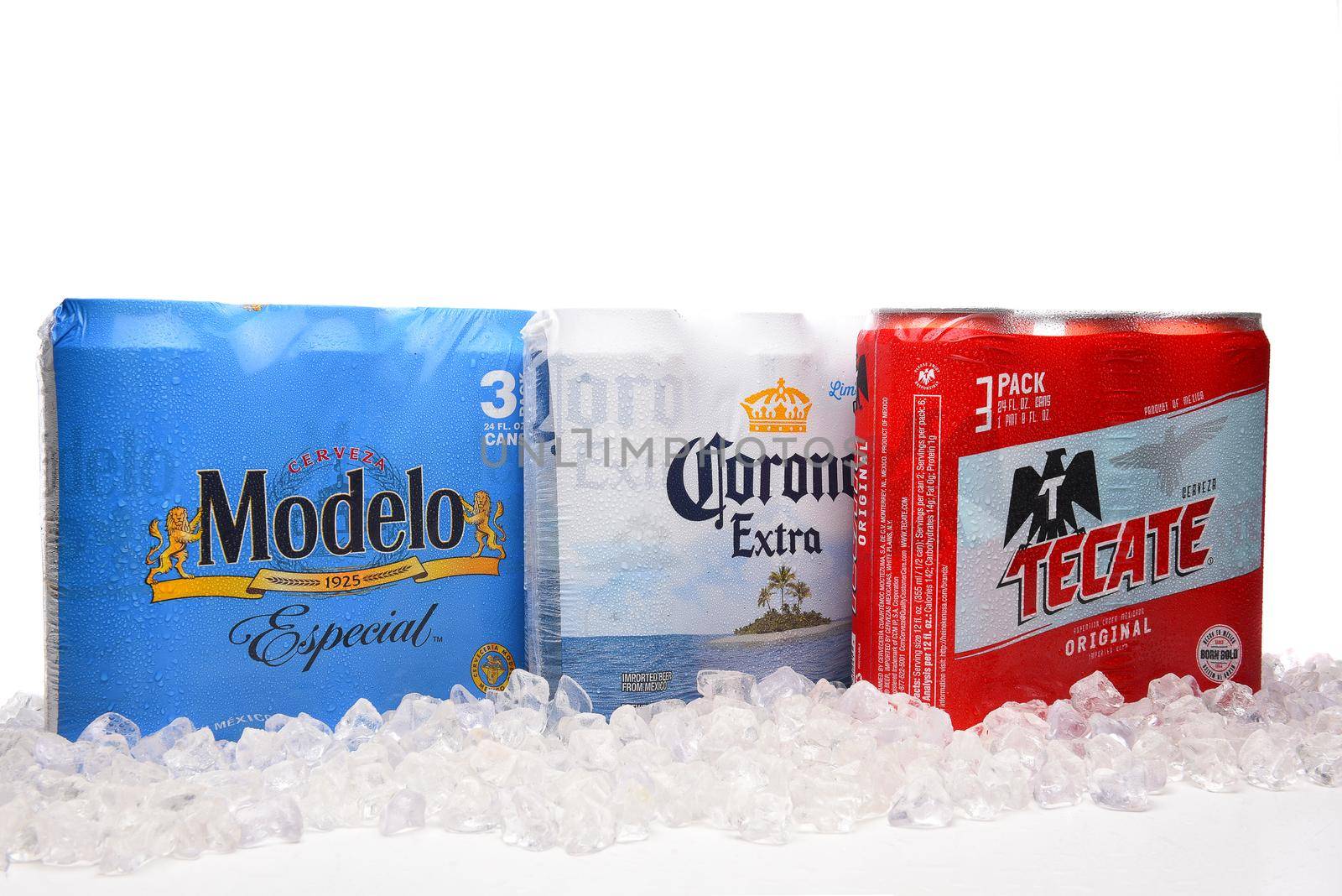 IRVINE, CALIFORNIA - MARCH 21, 2018: Three packs of 24 ounce Mexican Beers. Modelo Especial, Corona Extra and Tecate Original with ice.